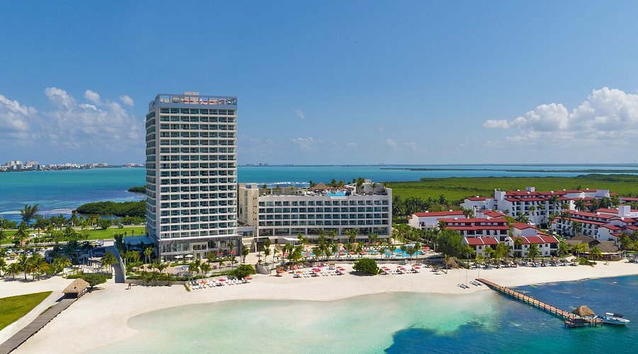 Breathless Cancun Soul adults-only all-inclusive resort in Cancun Hotel Zone with rooftop pool, ocean views, and vibrant nightlife atmosphere.