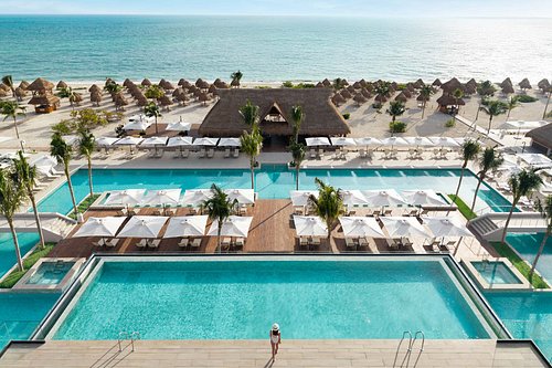 Excellence Playa Mujeres luxury adults-only all-inclusive resort with pristine beach, elegant suites, and refined atmosphere near Cancun.