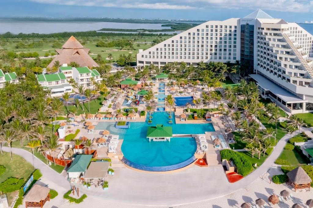 Iberostar Selection Cancun family-friendly all-inclusive resort with beachfront pools, tropical gardens, and ocean views.