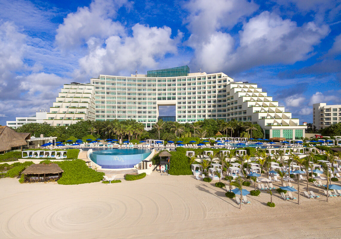 Live Aqua Beach Resort Cancun adults-only all-inclusive with sleek modern design, infinity pools, and upscale spa experience.