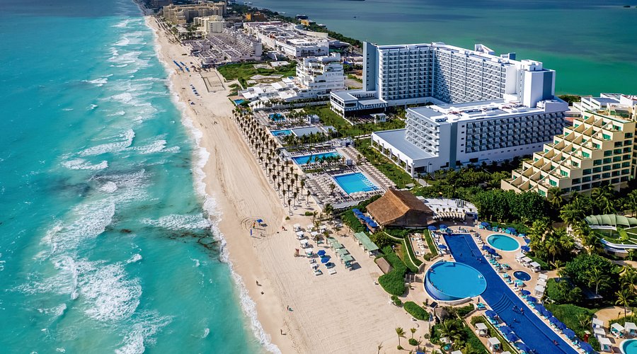 Riu Palace Kukulkan adults-only all-inclusive resort with modern beachfront pools and ocean views in Cancun Hotel Zone.