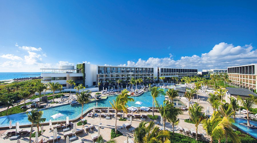 TRS Coral Hotel adults-only all-inclusive resort in Costa Mujeres with luxury suites, infinity pools, and exclusive 24-hour service.